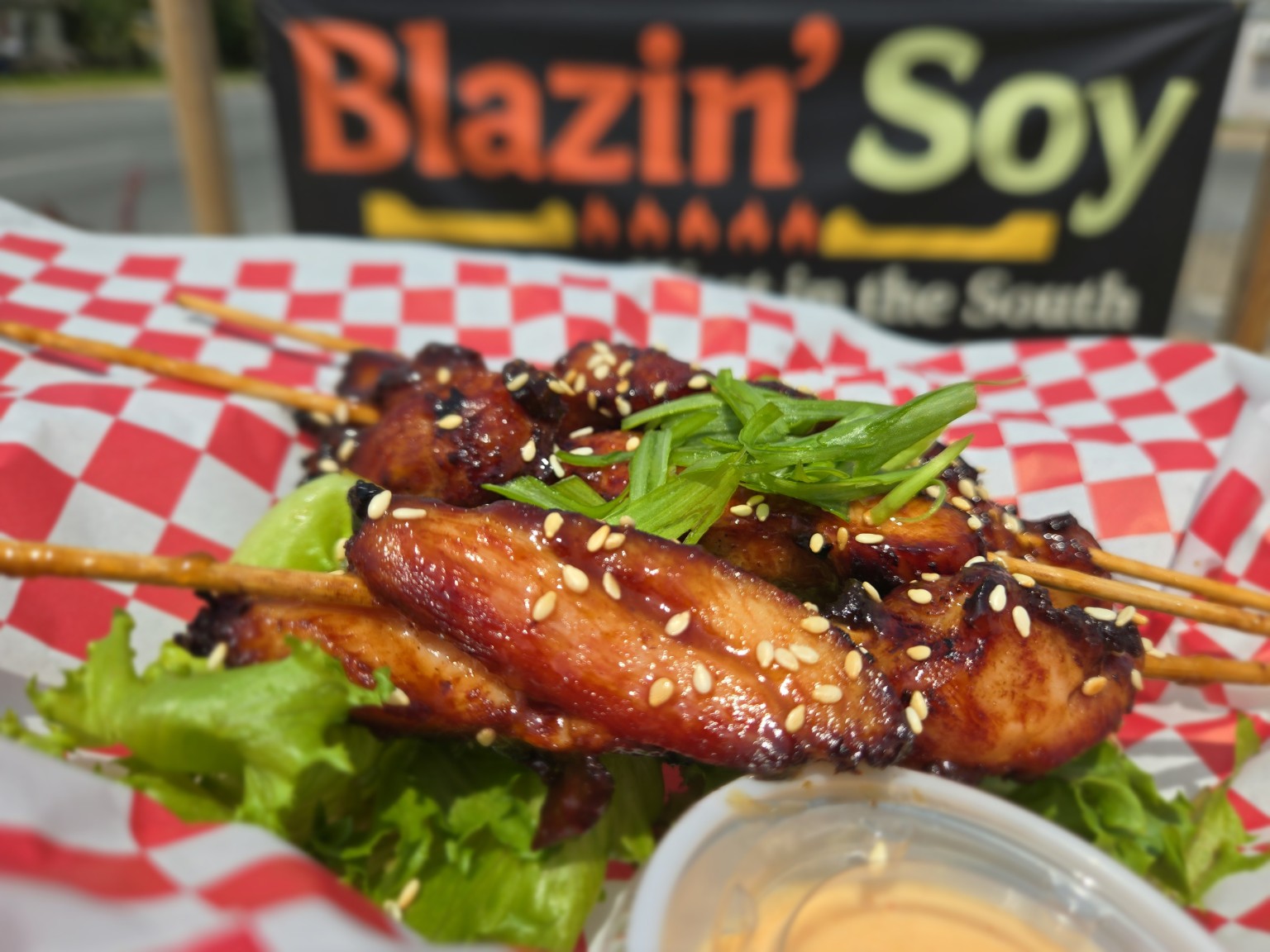 Glazed Blazin' Soy chicken skewers with sesame and scallions